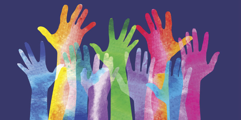 Colourful hands held up