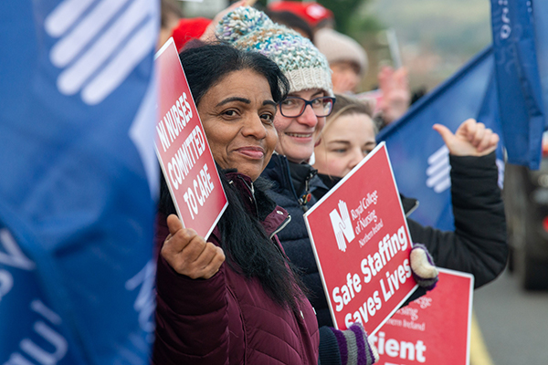 Nurses holding placards at a demonstration
