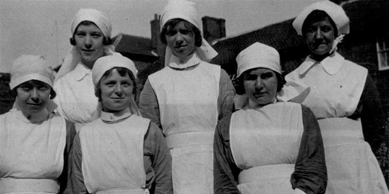 black and white photo of a group of nurses
