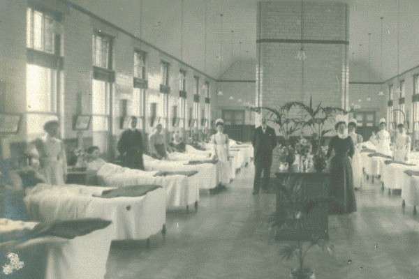 Doctors and nurses in busy ward